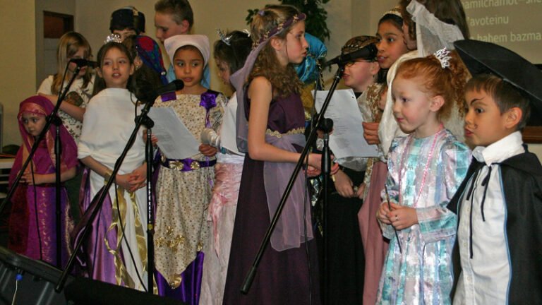 Children singing during a Purim celebration.